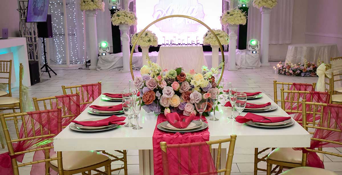 table with floral arrangement for wedding wedding in arya reception hall mesa az